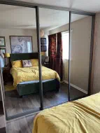 3 mirror doors with a charcoal frame, fitted in Fairfield